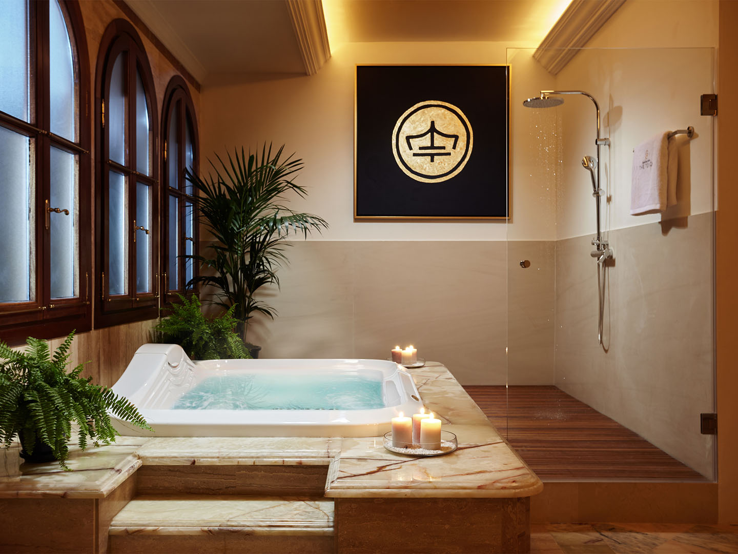 Marble spa bathroom with jacuzzi and rain shower