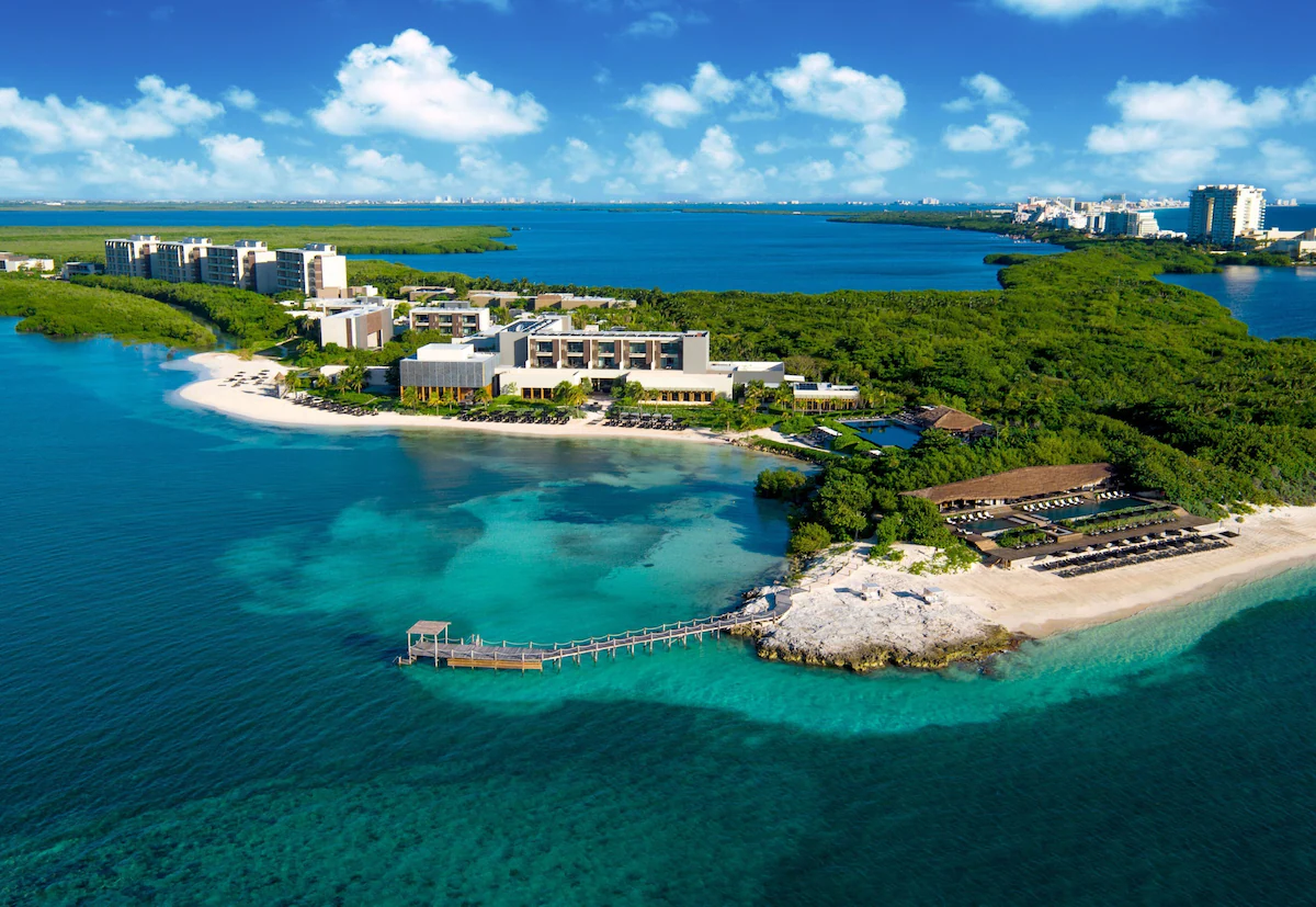 Aerial view of NIZUC Resort & Spa on its private peninsula in Cancun